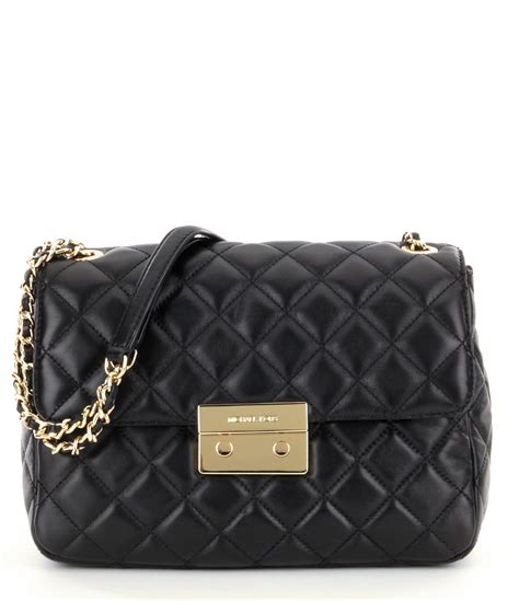 michael kors purse black leather|More.